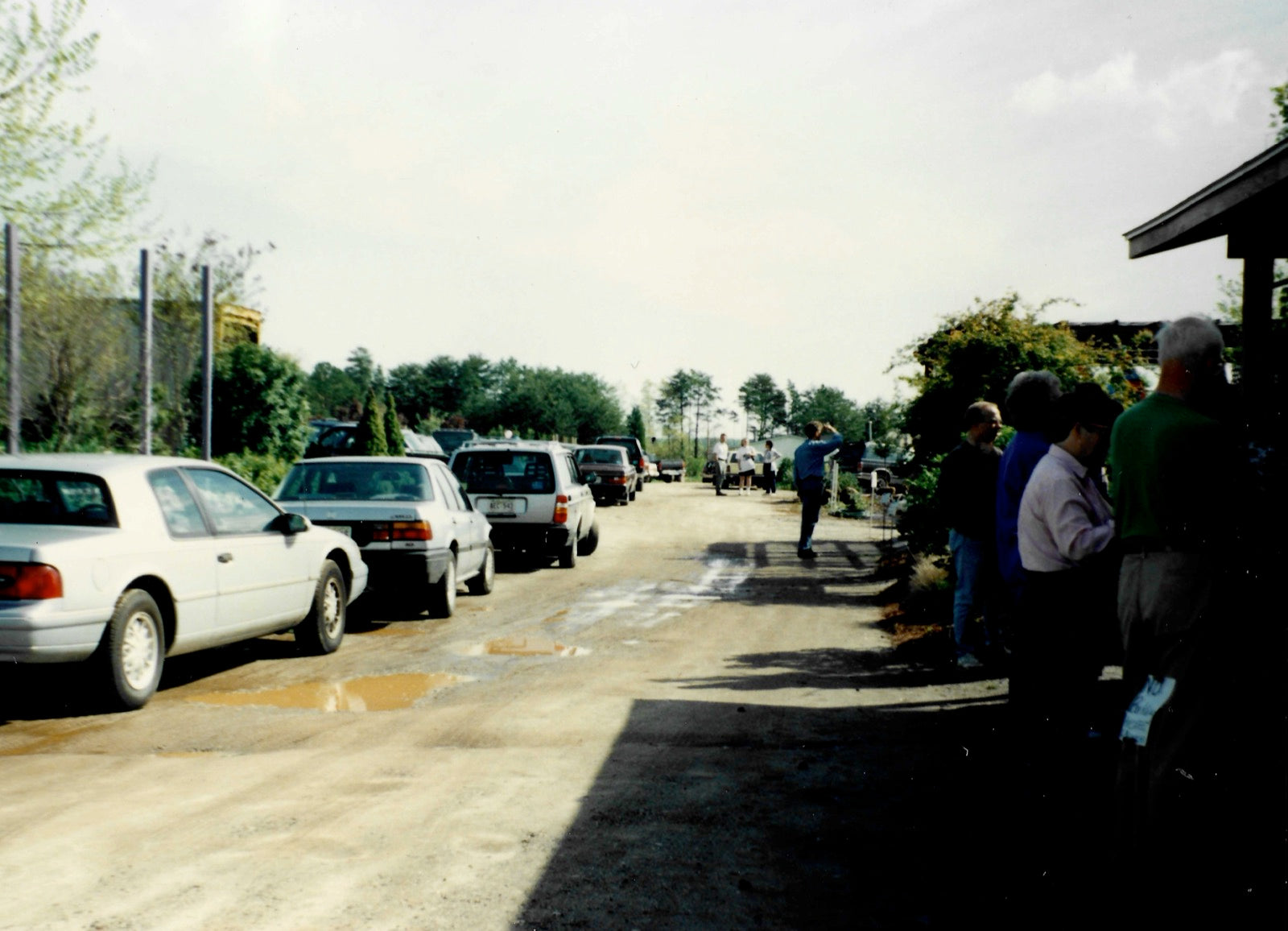 Cars lined up along the nursery drive as customers arrive for a spring gardening seminar